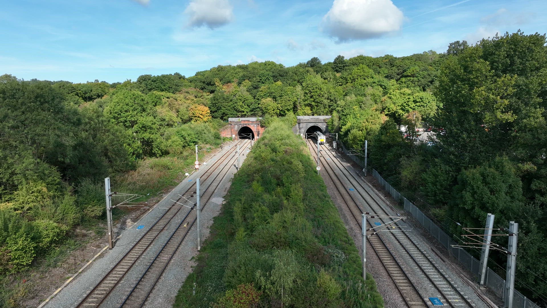 Fast Commuter Train Entering a Tunnel