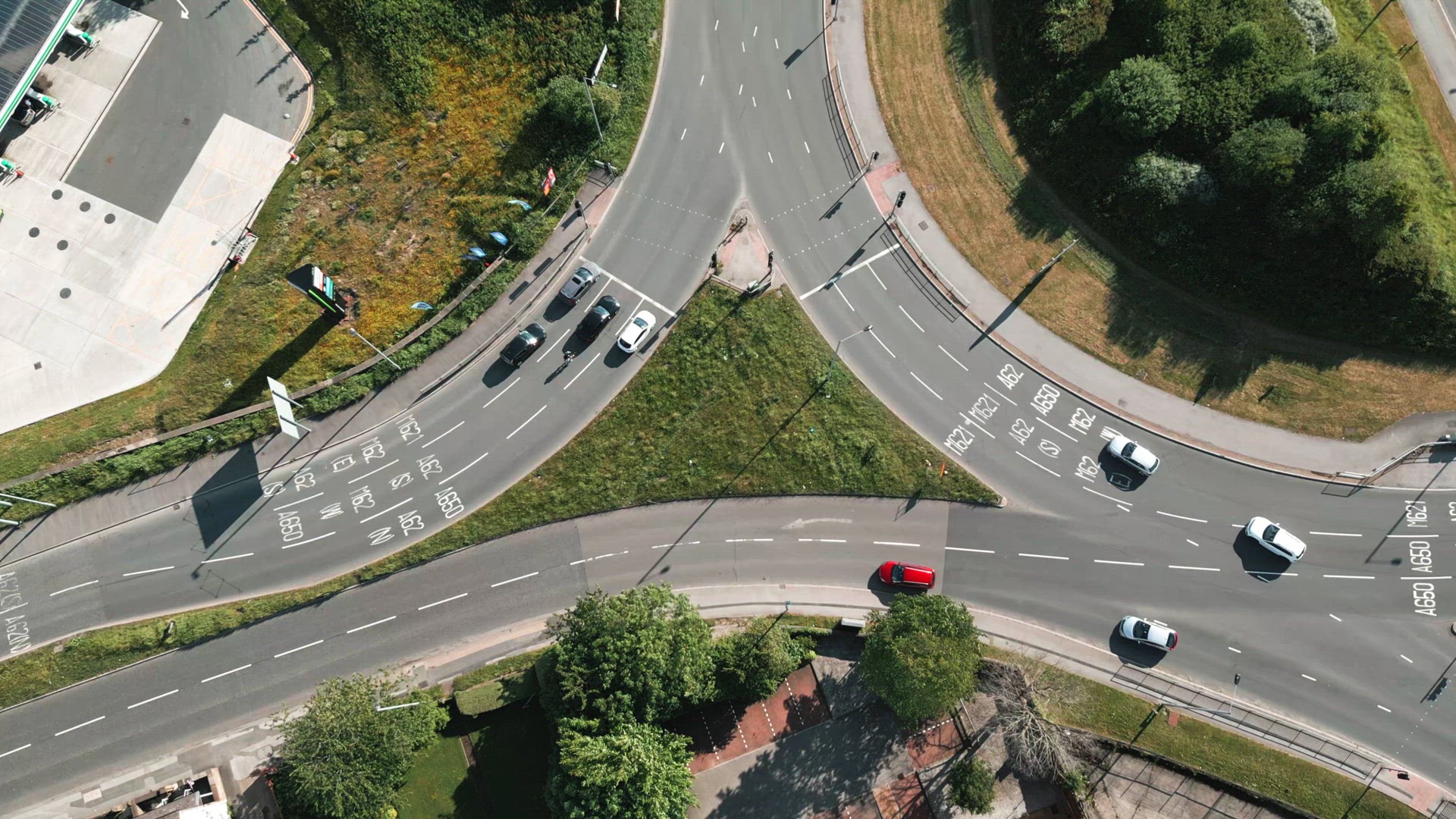 Vehicles Stopping at a Traffic Light Controlled Roundabout System