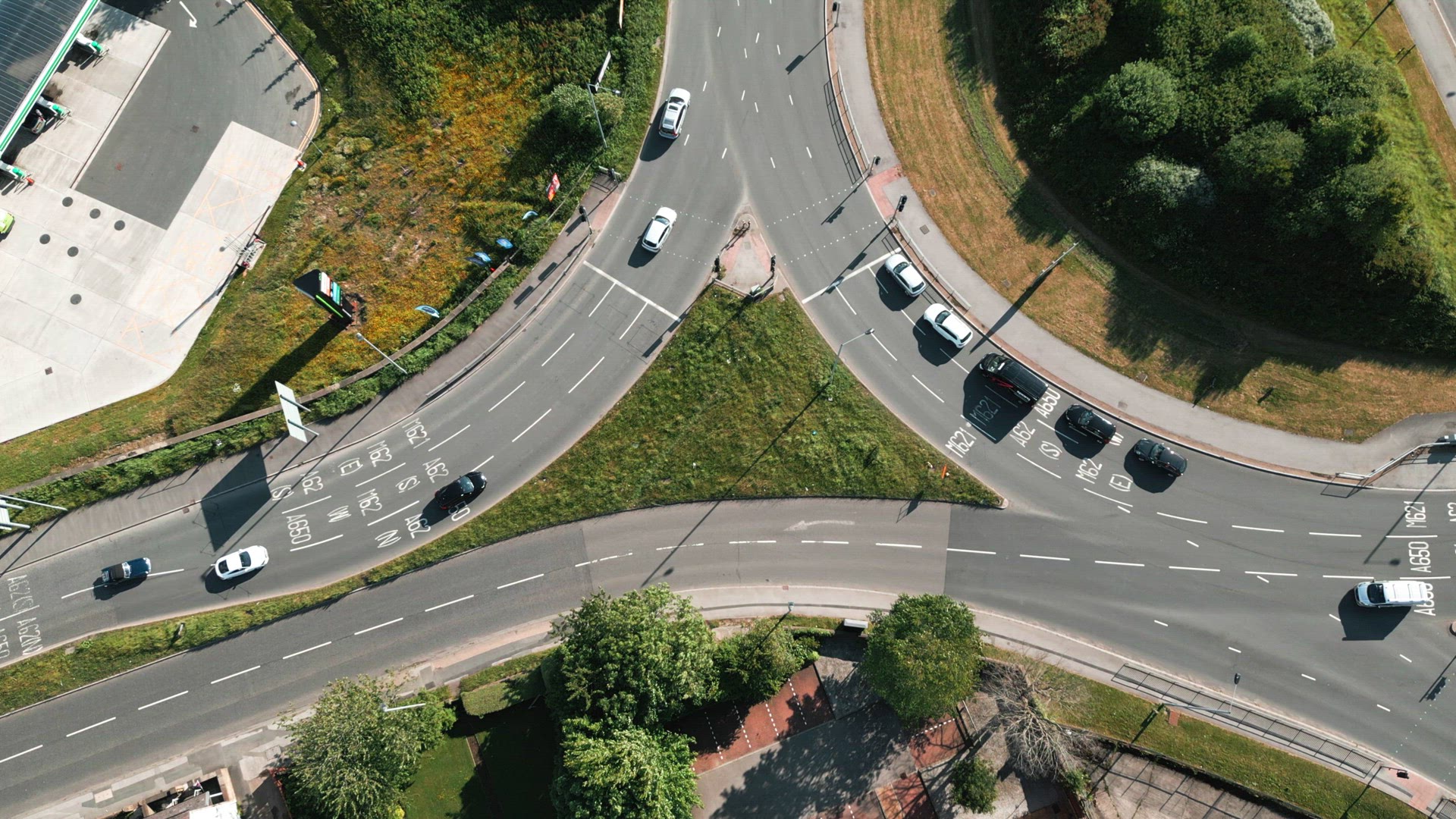 Vehicles Stopping at a Traffic Light Controlled Roundabout System