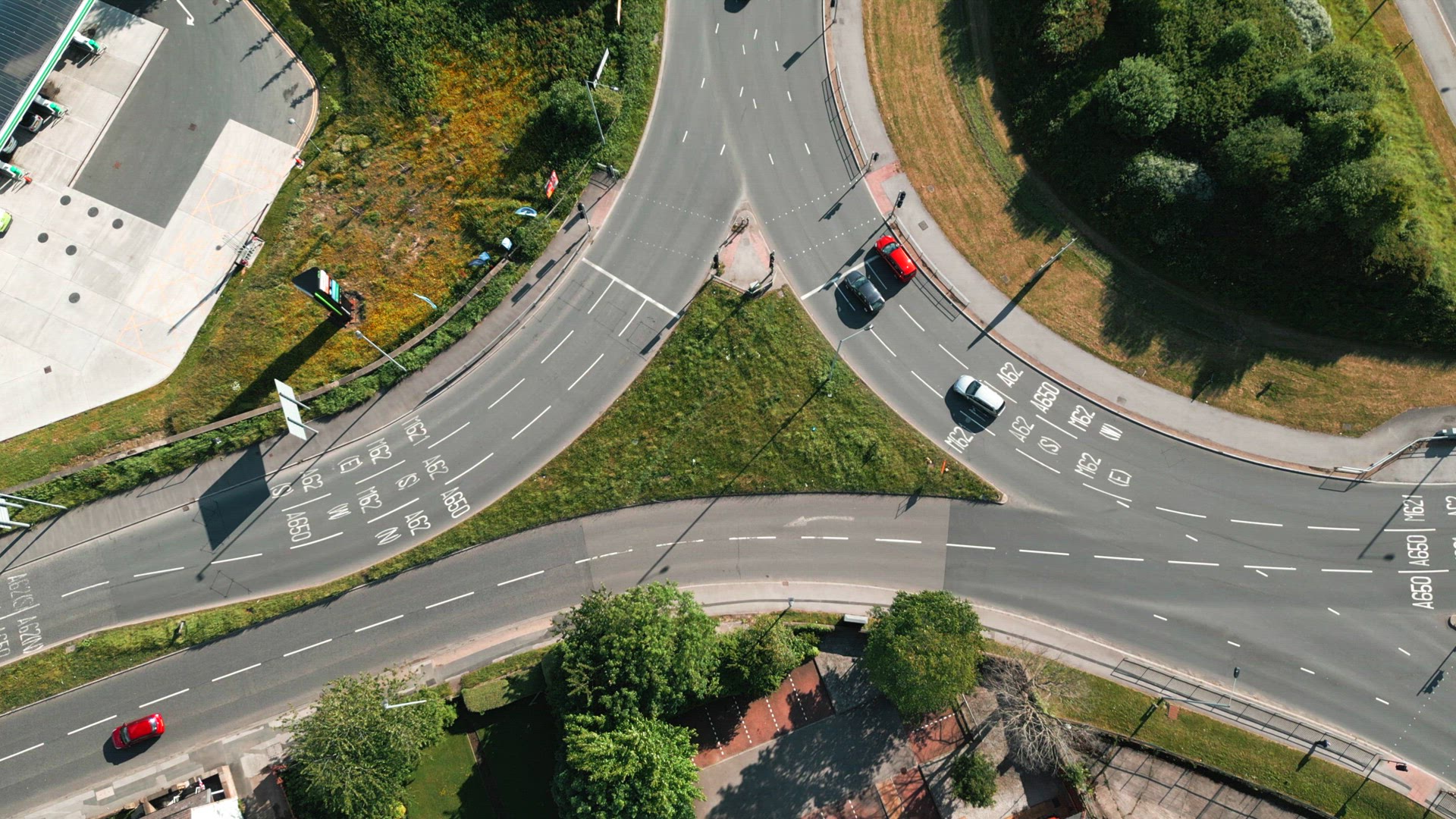 Vehicles Stopping at a Traffic Light Controlled Roundabout System