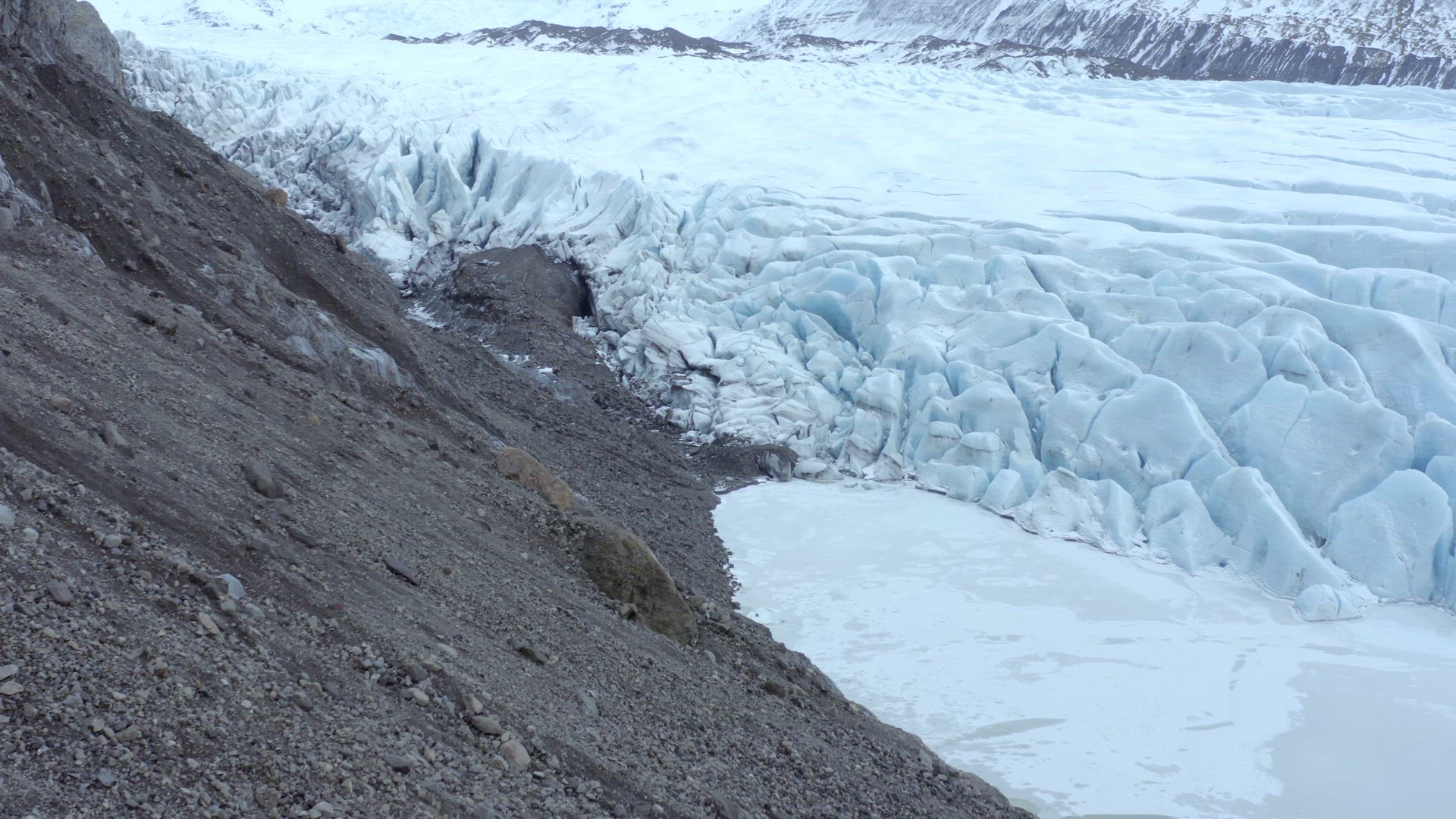 Photographer Exploring a Glacier in Iceland