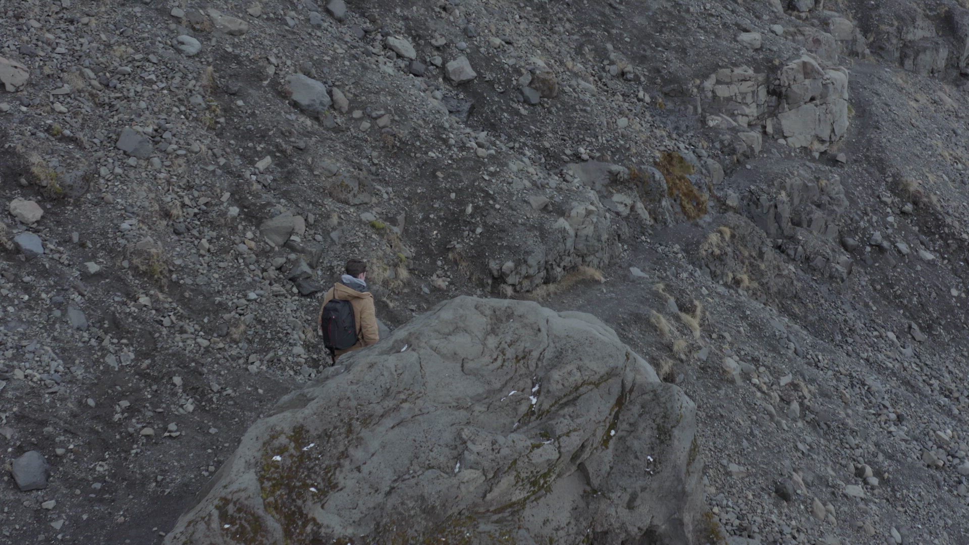 A Photographer Exploring a Huge Glacier in Iceland