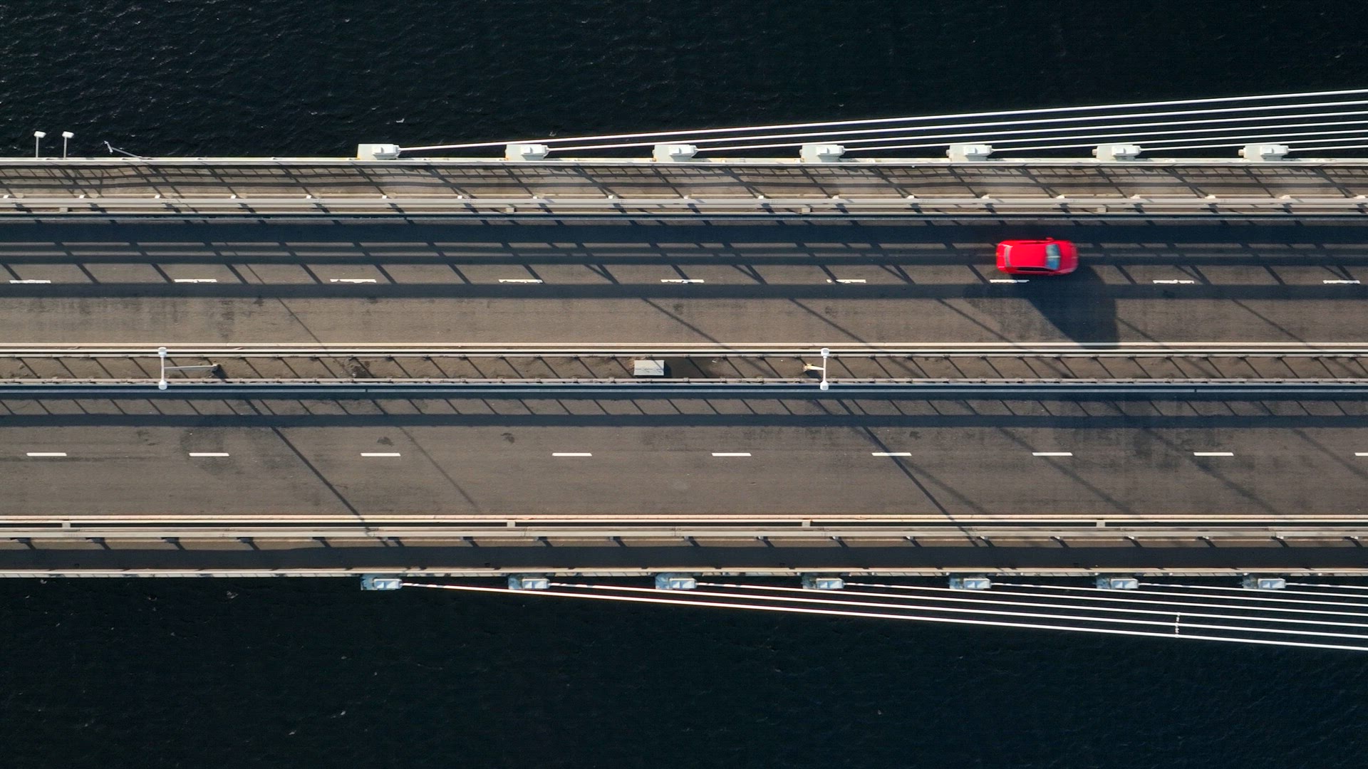 Vehicles Crossing a Suspension Cable Stayed Bridge in Slow Motion