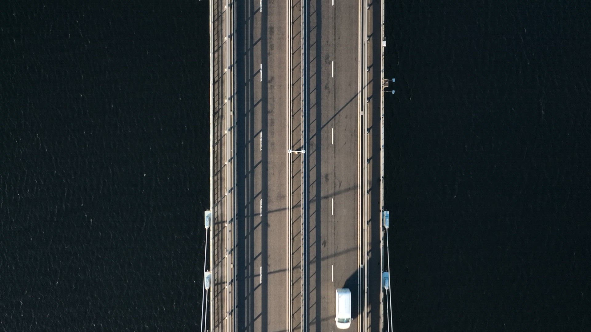 Vehicles Crossing a Suspension Cable Stayed Bridge in Slow Motion