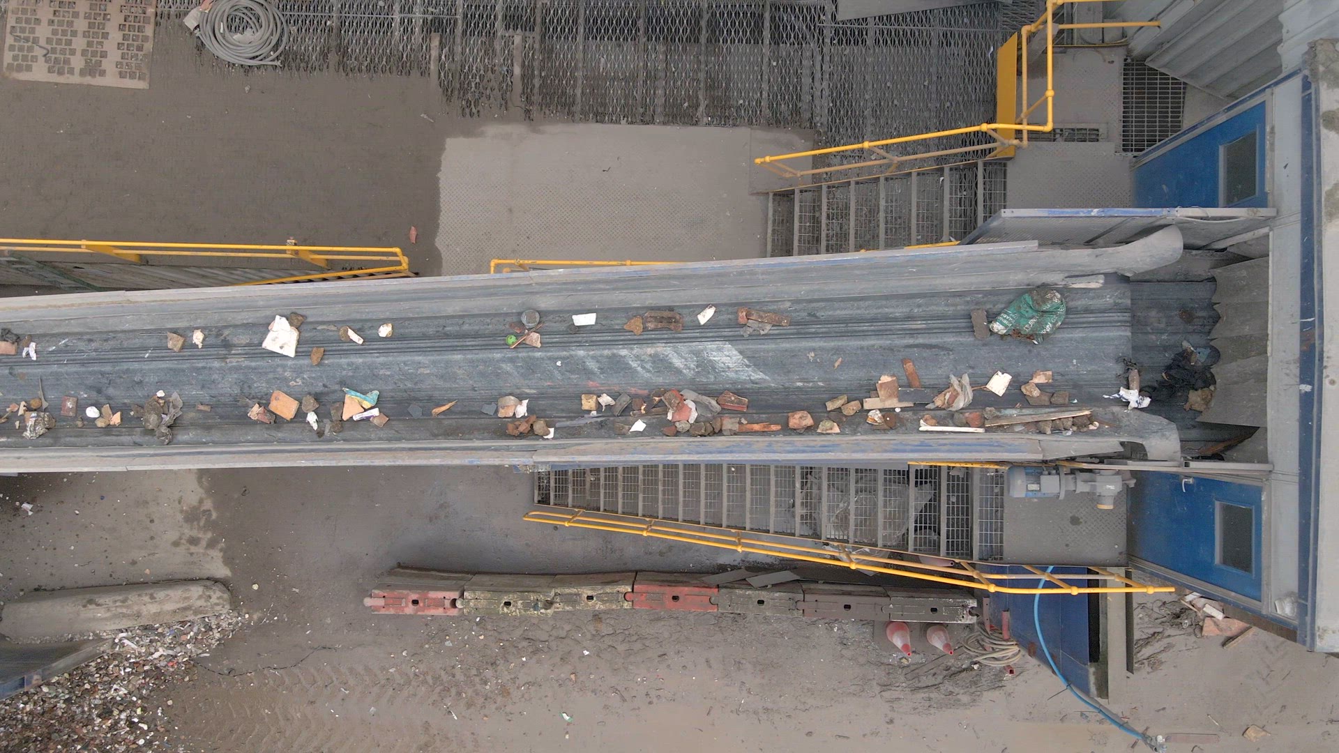 Waste Moving Through a Recycling Plant Belt
