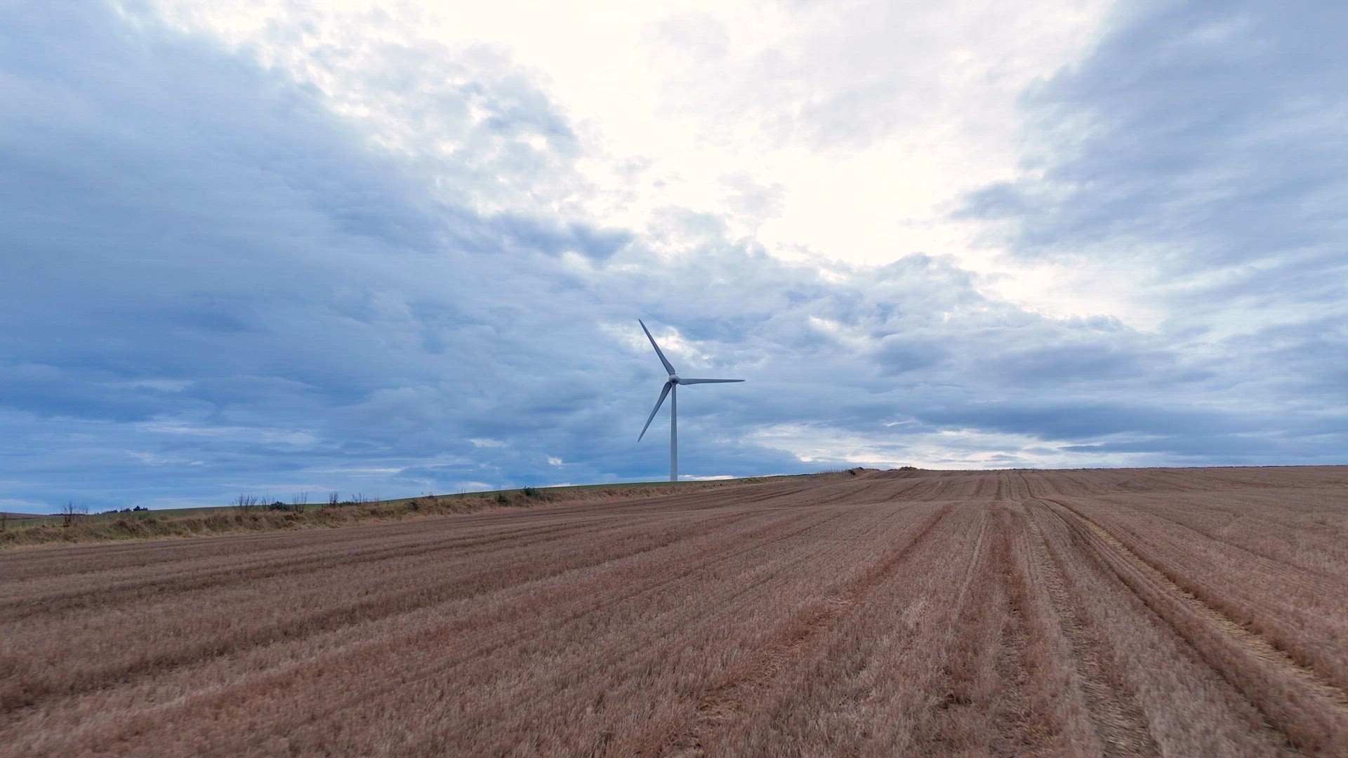 Onshore Wind Farm Turbines in the Countryside Generating Renewable Energy