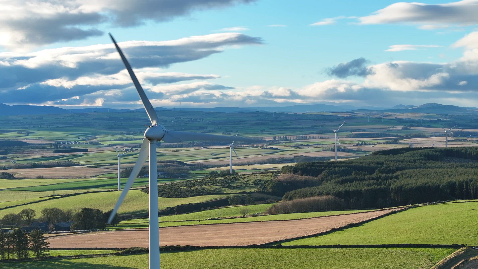 Onshore Wind Farm Turbines in the Countryside Aerial View