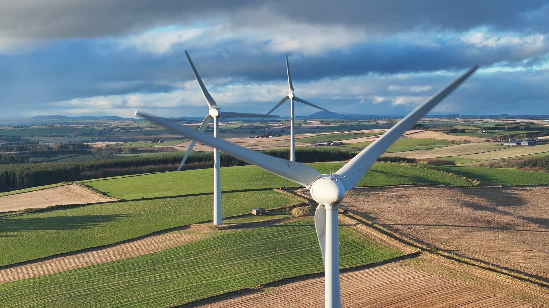 Wind Farm Turbines Generating Green Renewable Energy Aerial View