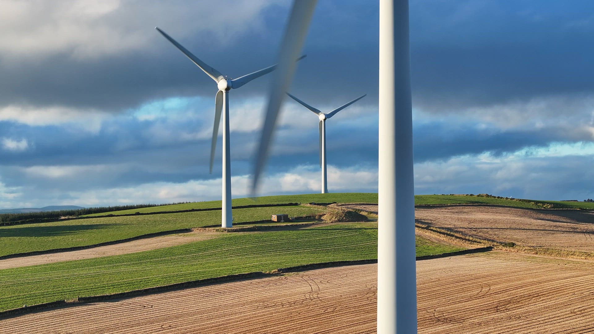 Wind Farm Turbines Generating Green Renewable Energy Aerial View