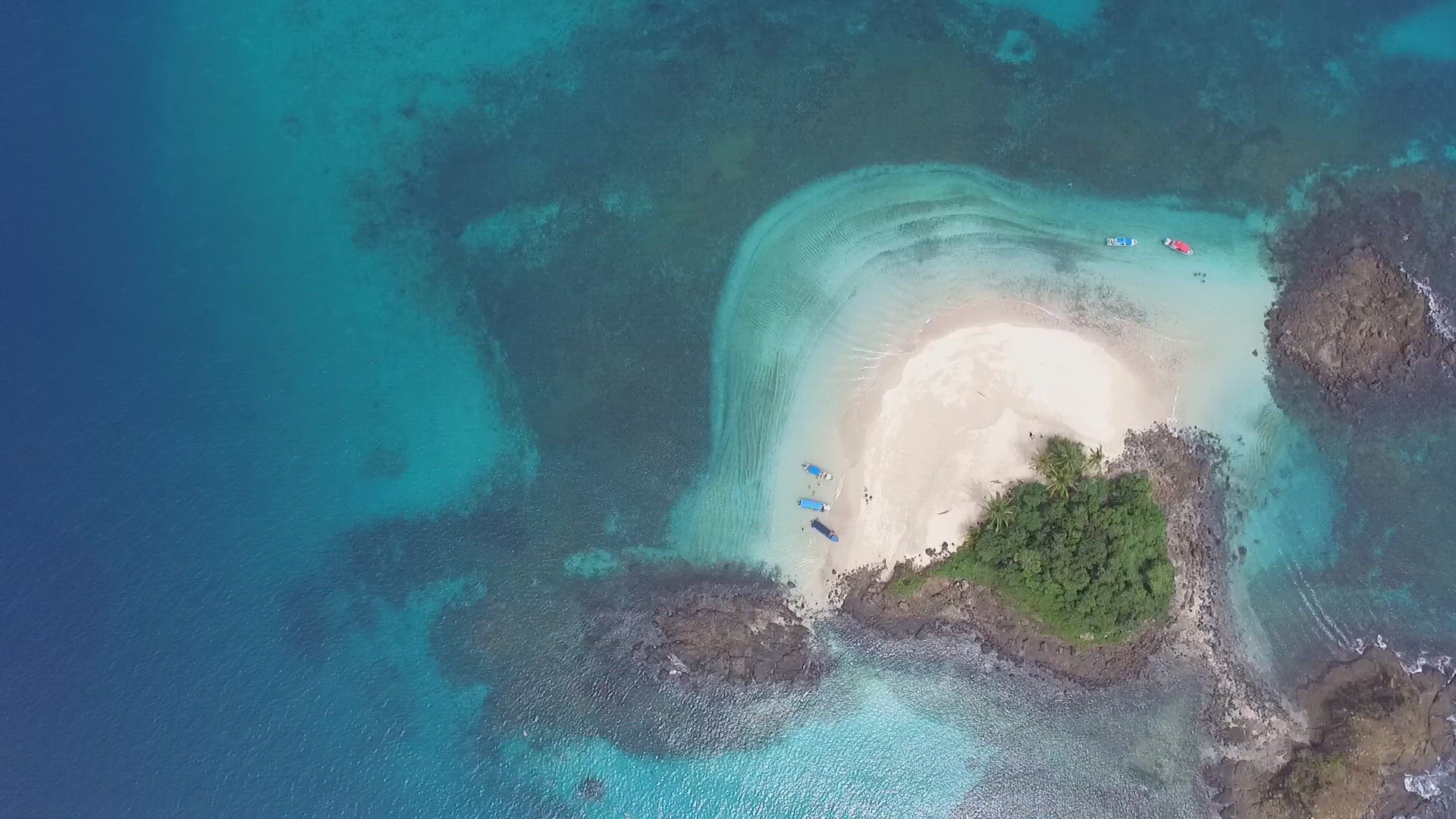 Idyllic paradise virgin unspoiled tropical island aerial drone view