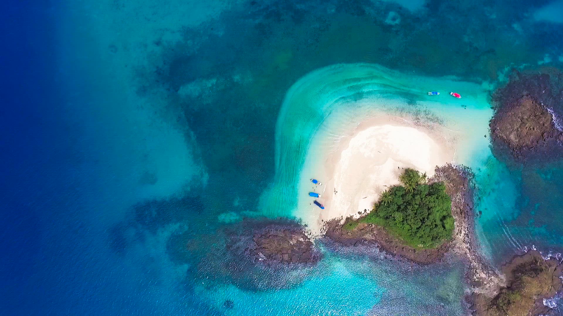 Idyllic paradise virgin unspoiled tropical island aerial drone view
