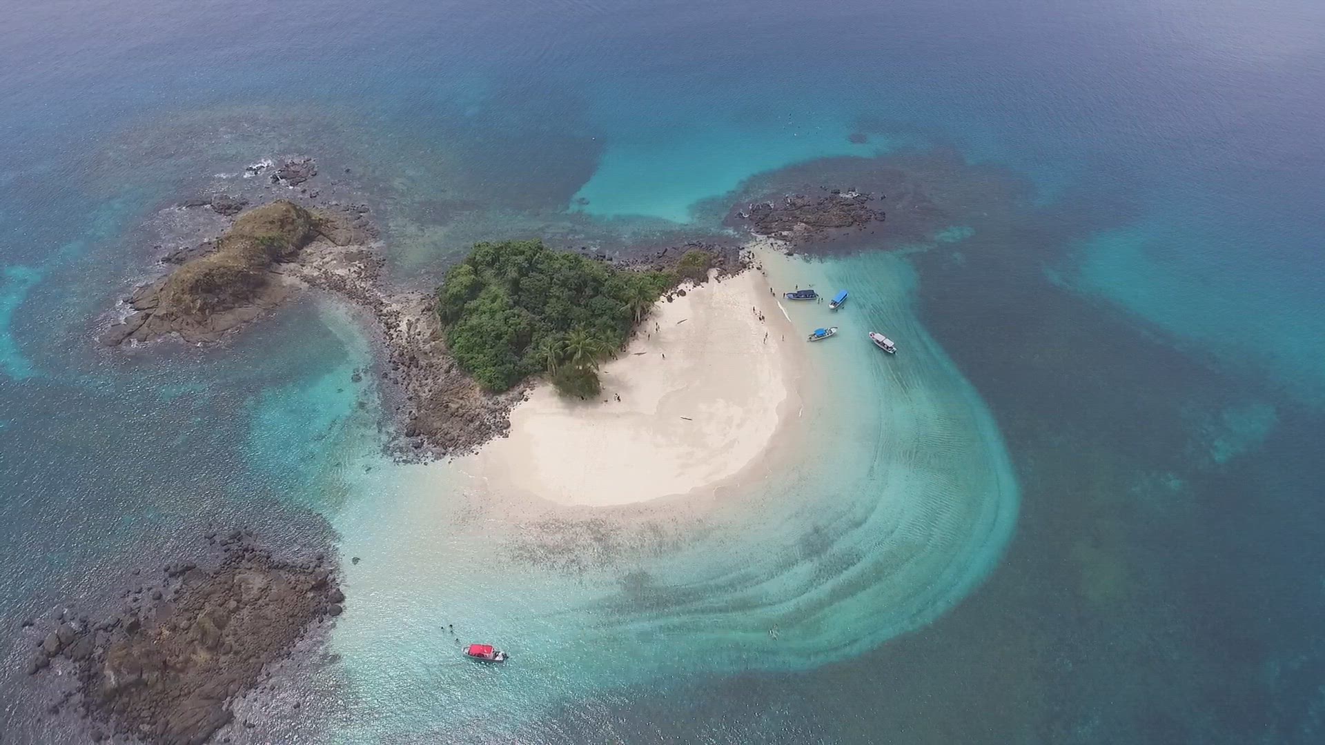 Idyllic paradise virgin unspoiled tropical island aerial drone view