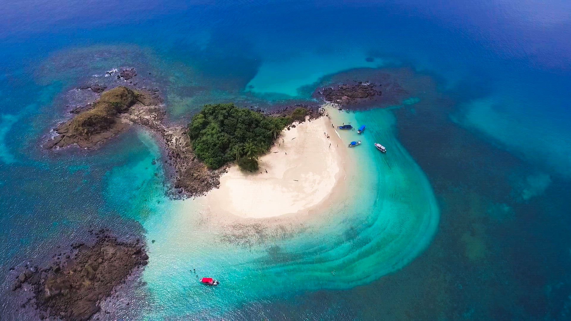 Idyllic paradise virgin unspoiled tropical island aerial drone view