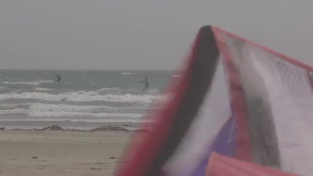 Man kite boarding at beach