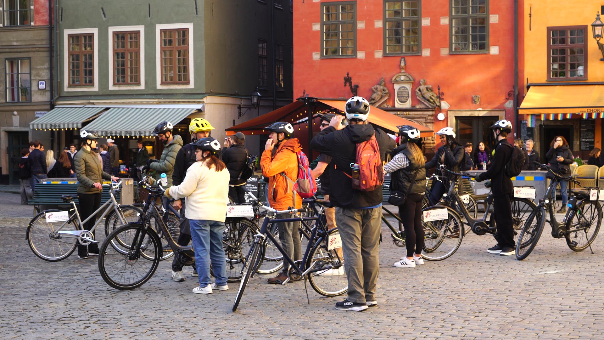 tourists on bicycles in Old Town - sightseeing.MP4