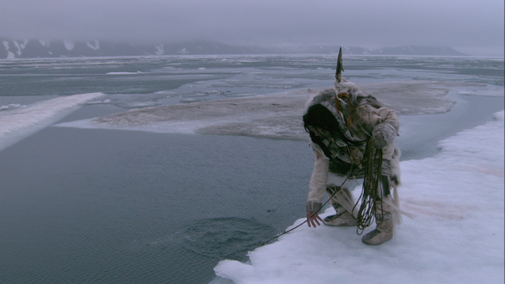 inuit hunter spear fishing