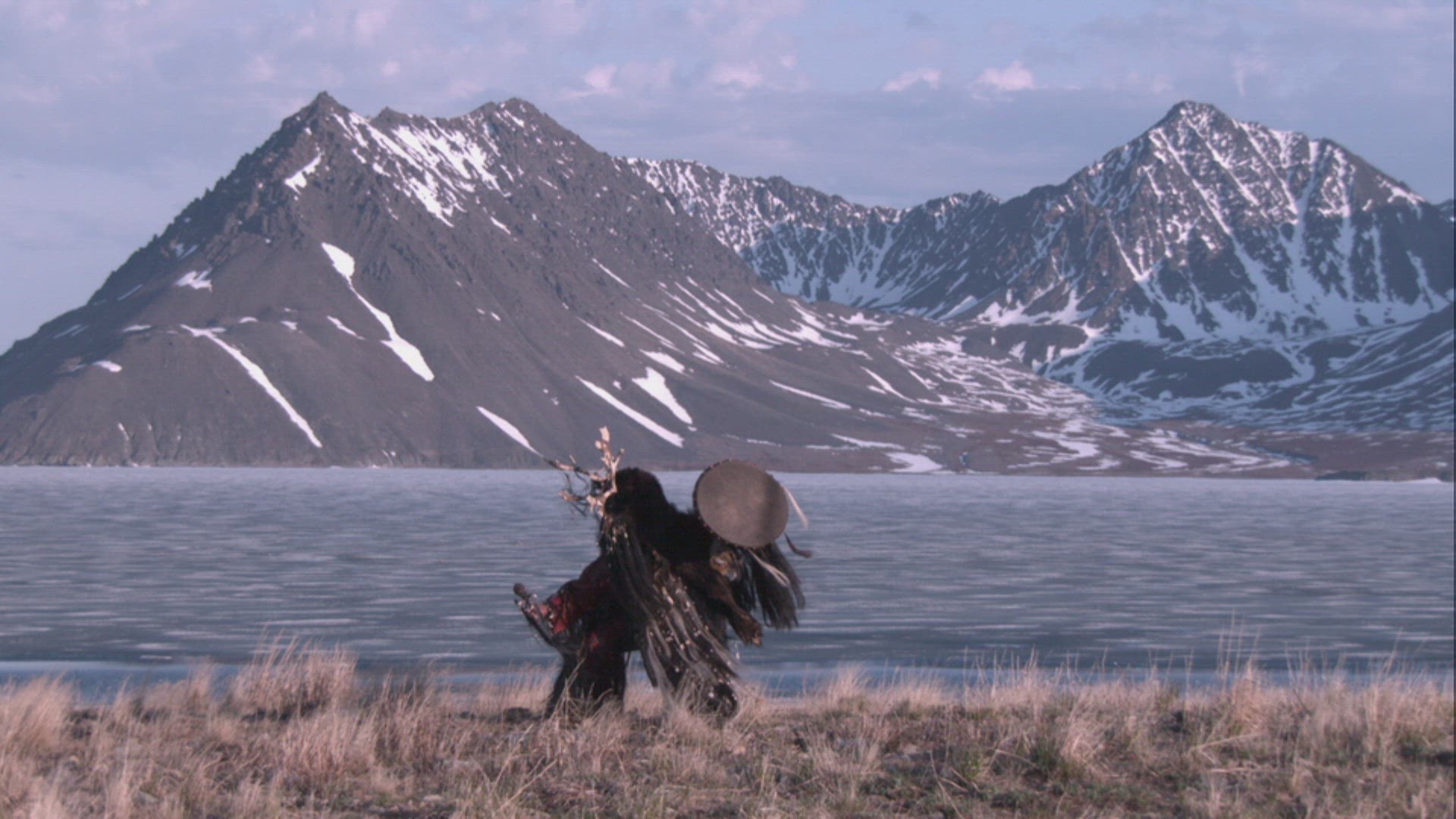 inuit hunter performing fire ceremony