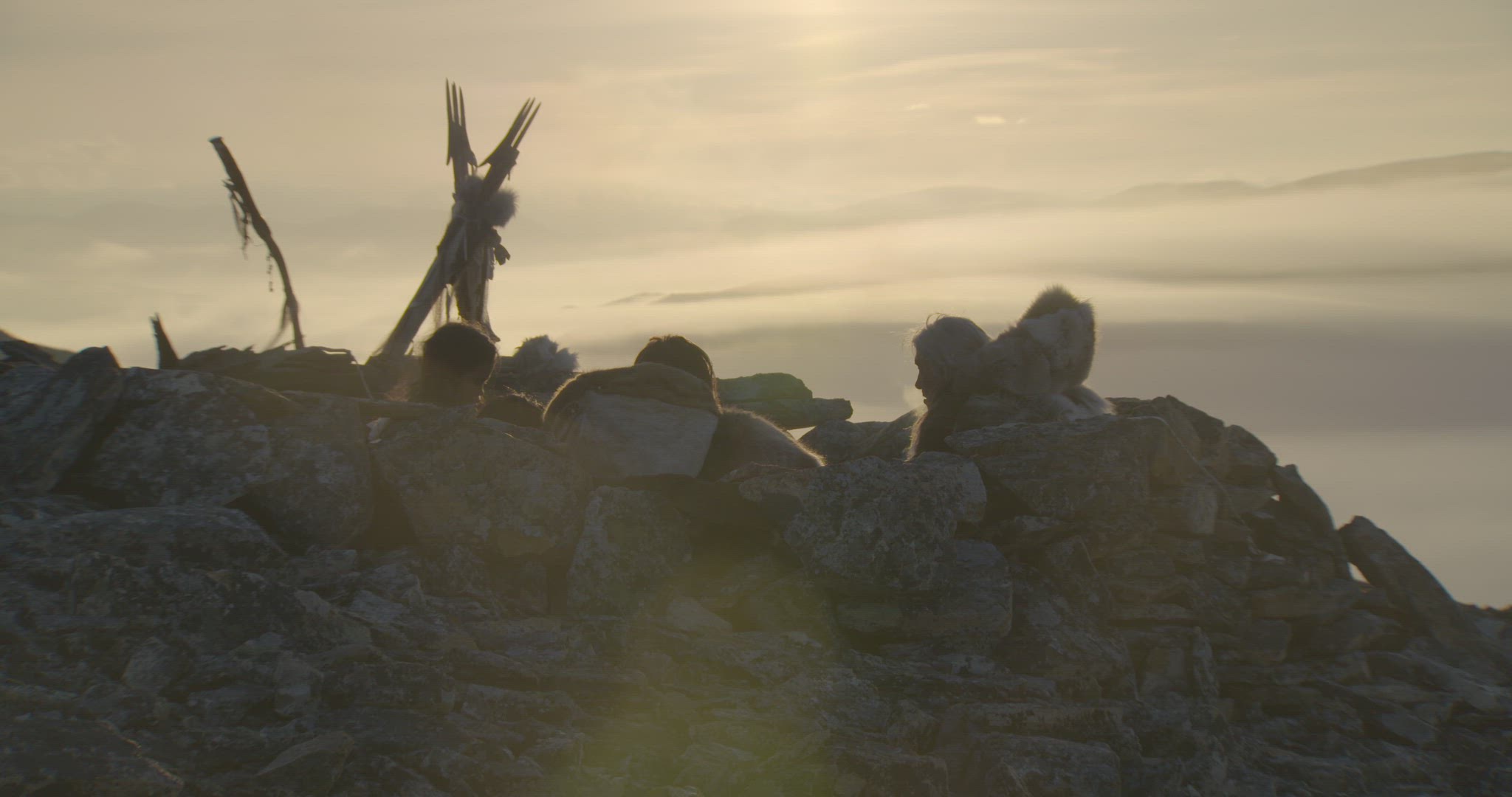 nomadic hunters sheltering on mountaintop