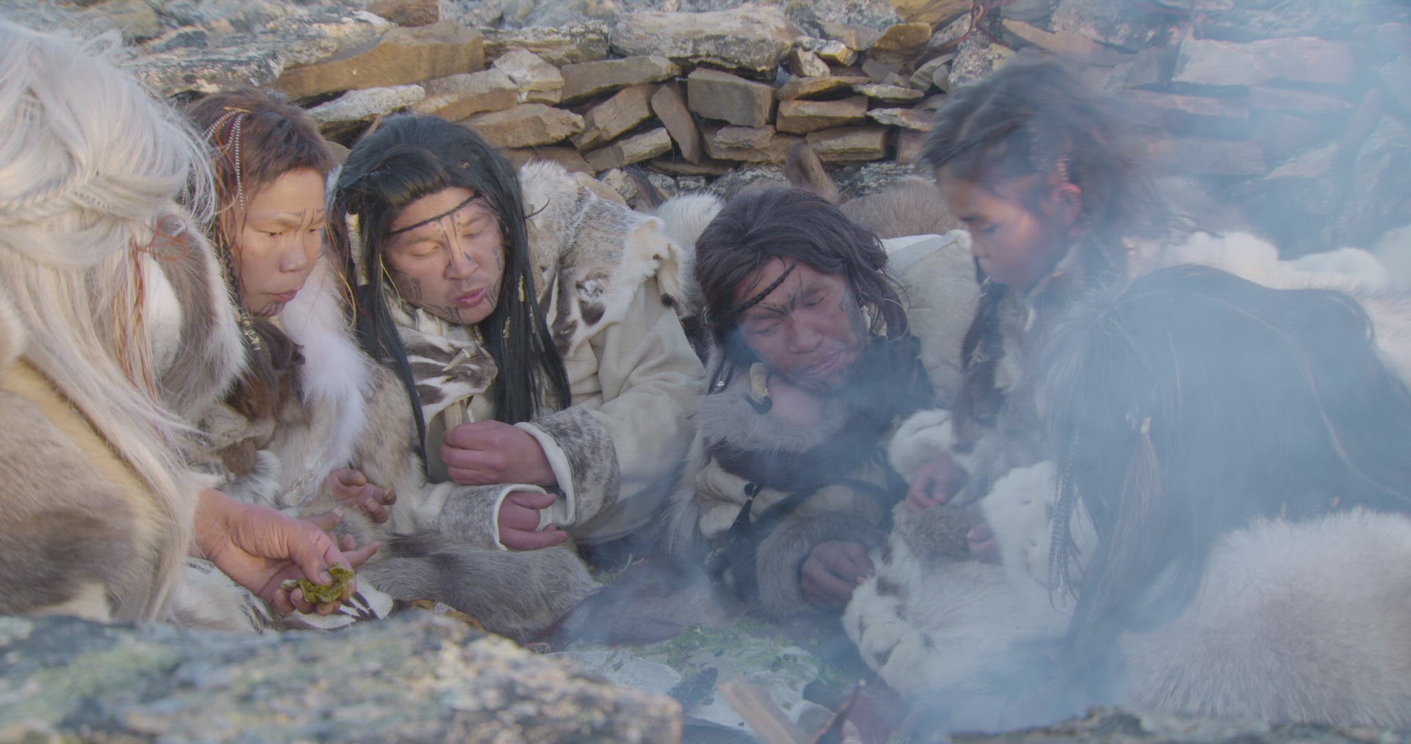 nomadic hunters sheltering on mountaintop