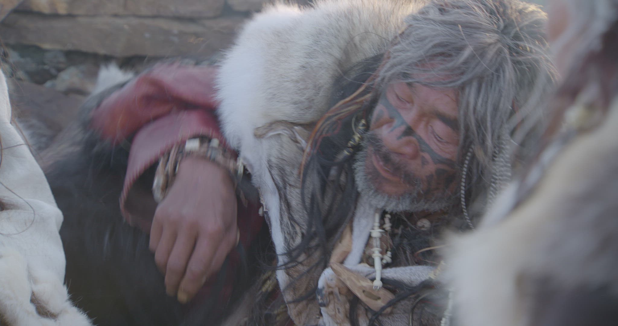 nomadic hunters sheltering on mountaintop
