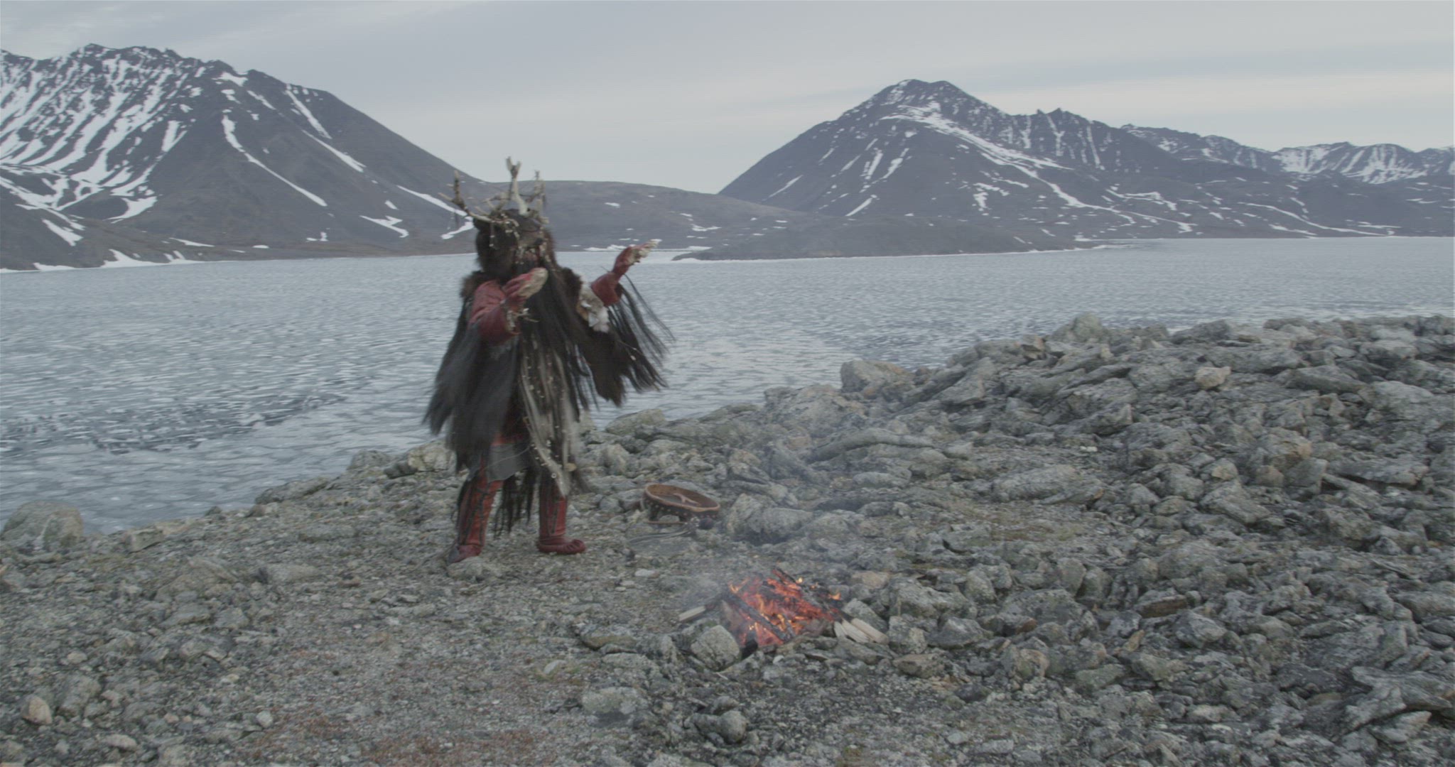 Inuit hunter performing fire ceremony