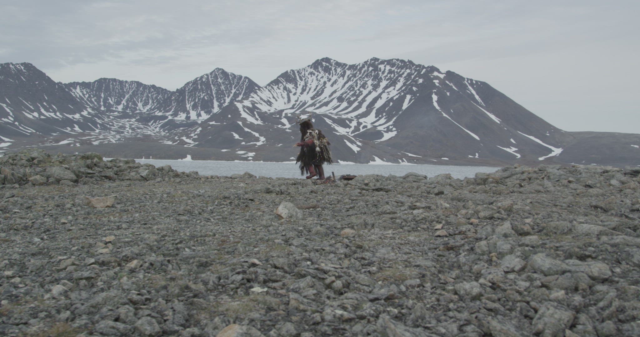 Inuit hunter performing fire ceremony