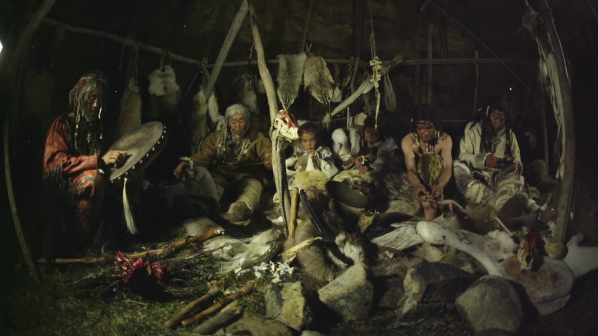 nomadic hunter family inside hut