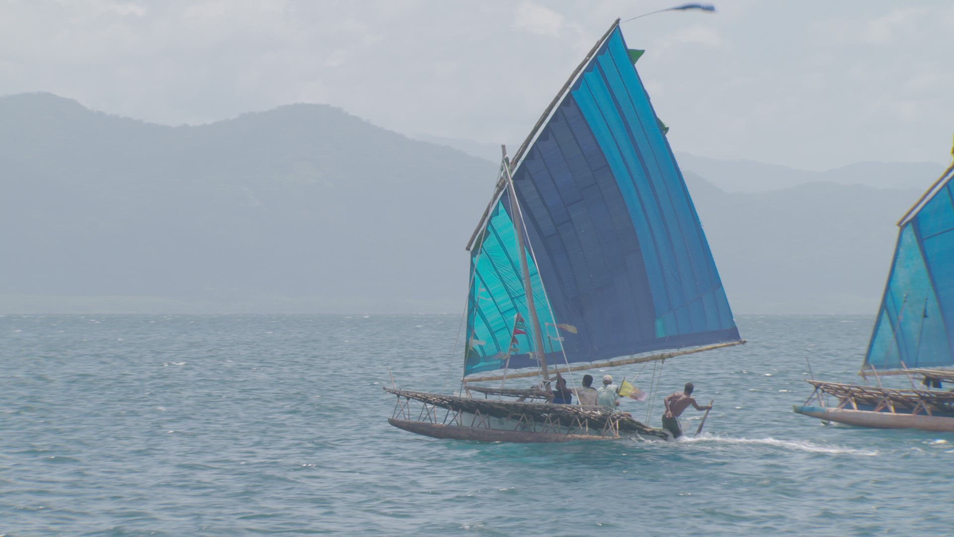 war canoe on water