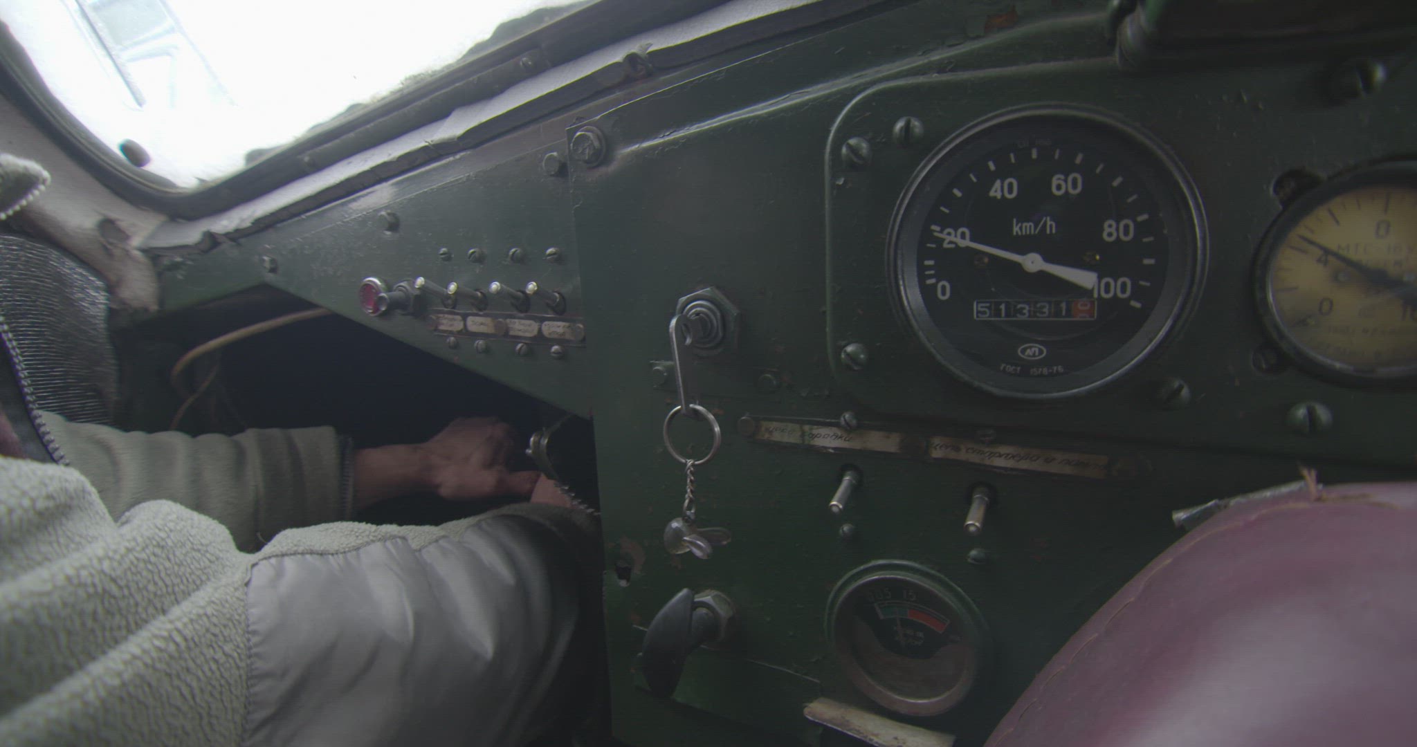 man driving remodelled Russian armoured vehicle