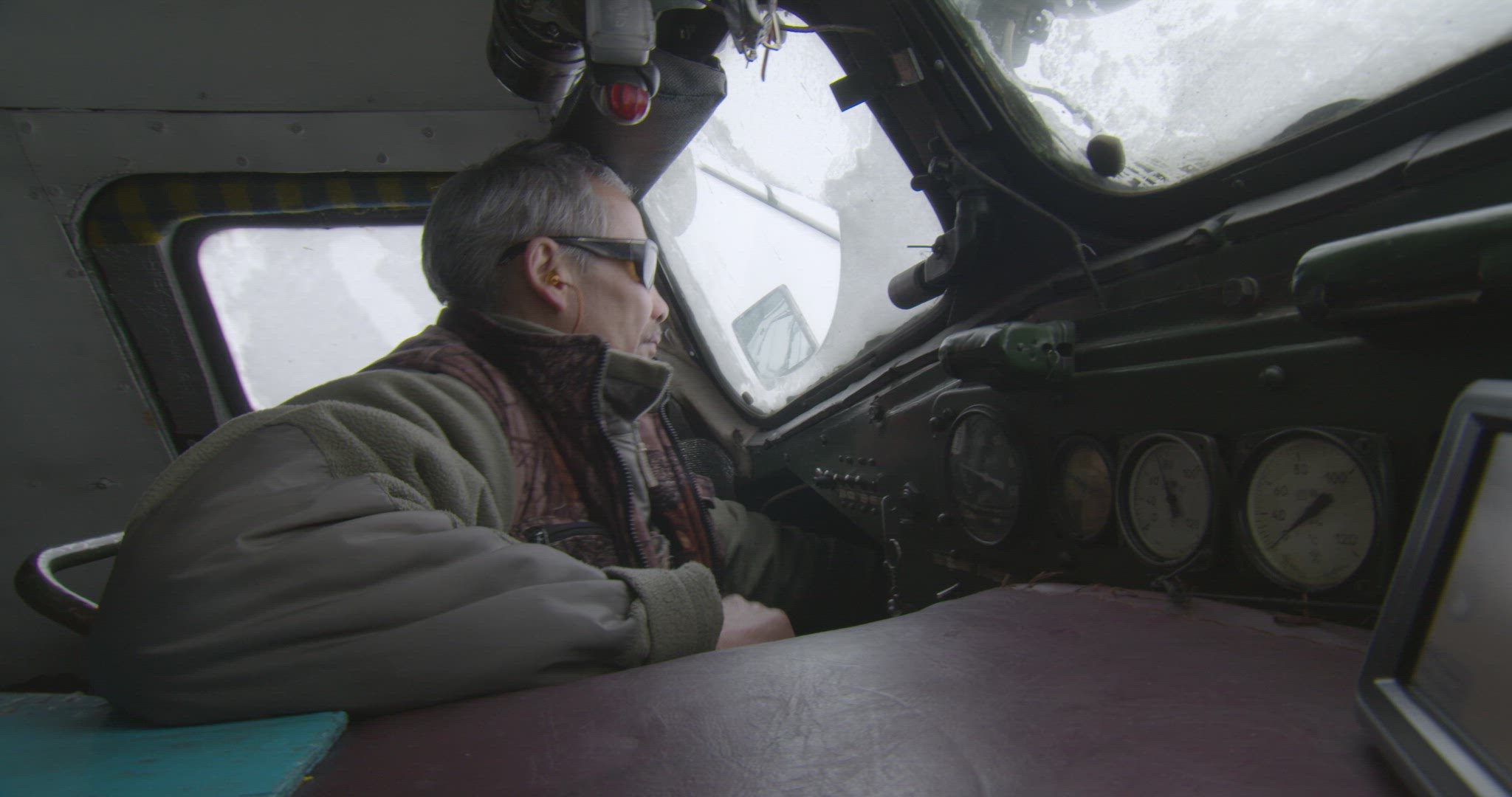 man driving remodelled Russian armoured vehicle