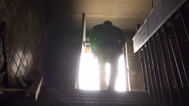 A man goes to the roof