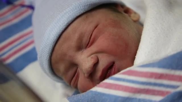 Close up of caucasian newborn baby boy