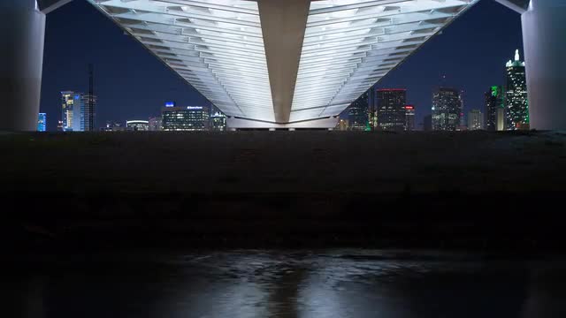 The Dallas Skyline from underneath The Margaret Hunt Hill Bridge in Dallas, Texas.