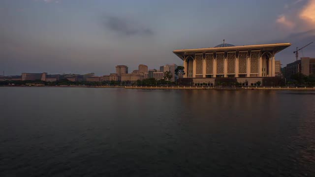 Day to Night Sunset Time Lapse at a Mosque by the Lake