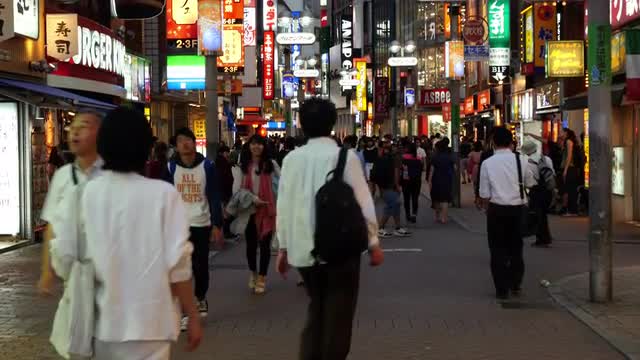 Pan Down of Busy Shibuya Shopping District Daytime - Tokyo Japan