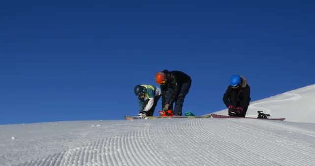 Snowboarders Strapping In 4k