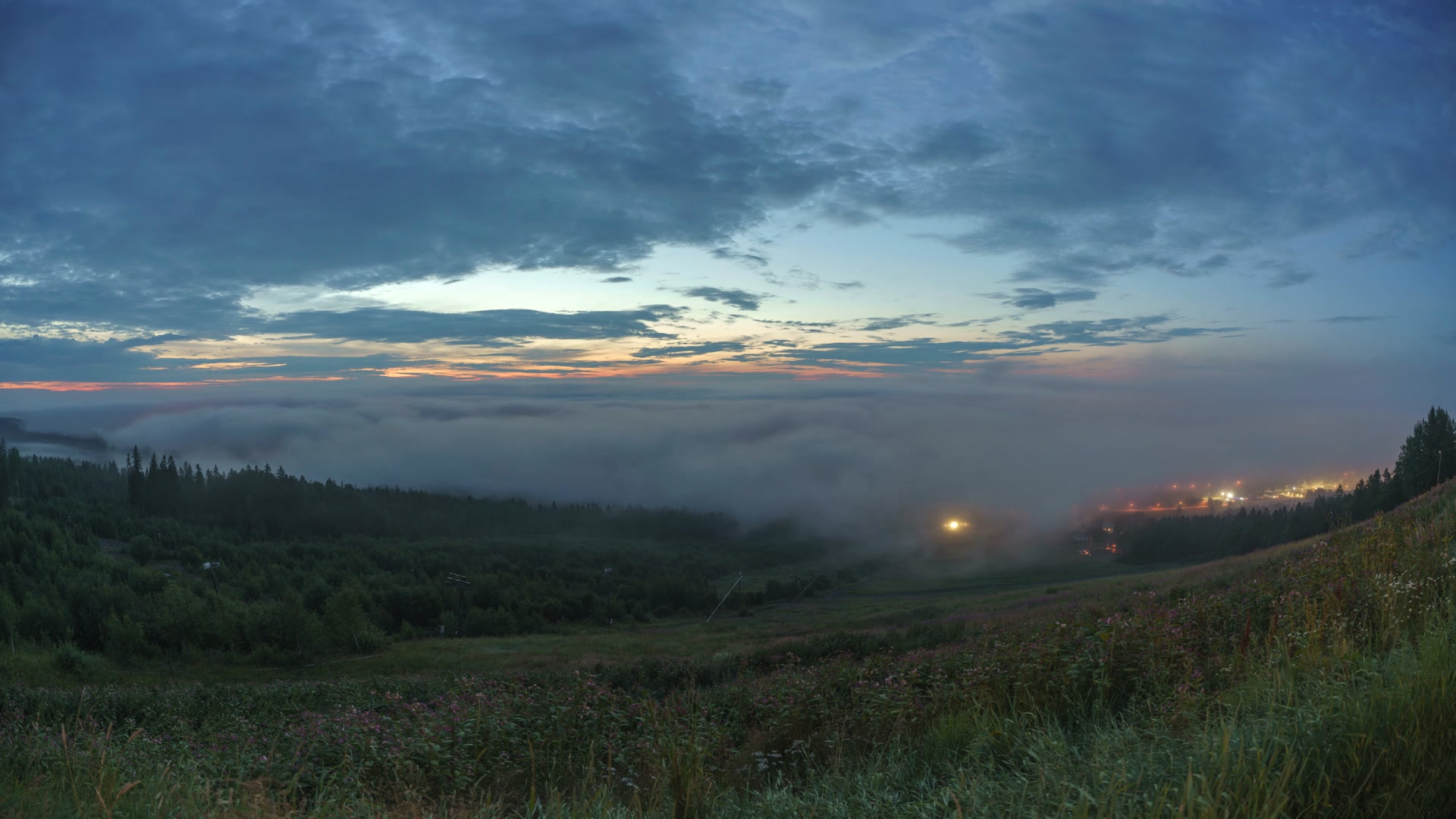 Mist and clouds over city in northern Sweden