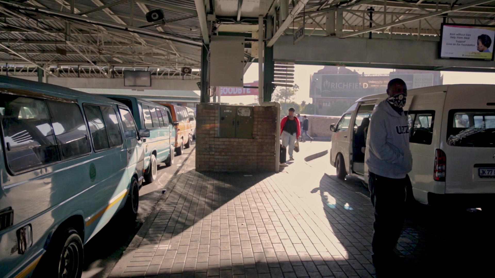 Commuters wearing face masks in a taxi rank in Johannesburg