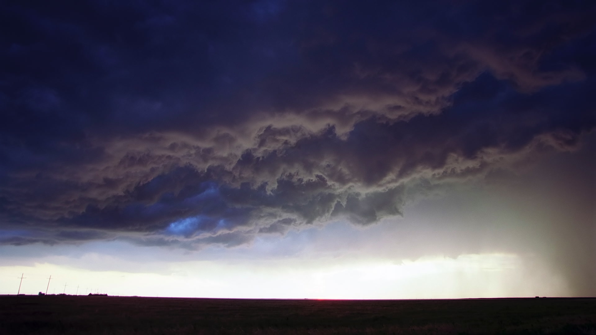 Dark, inky storm clouds with lightning, Super 35mm to 4K