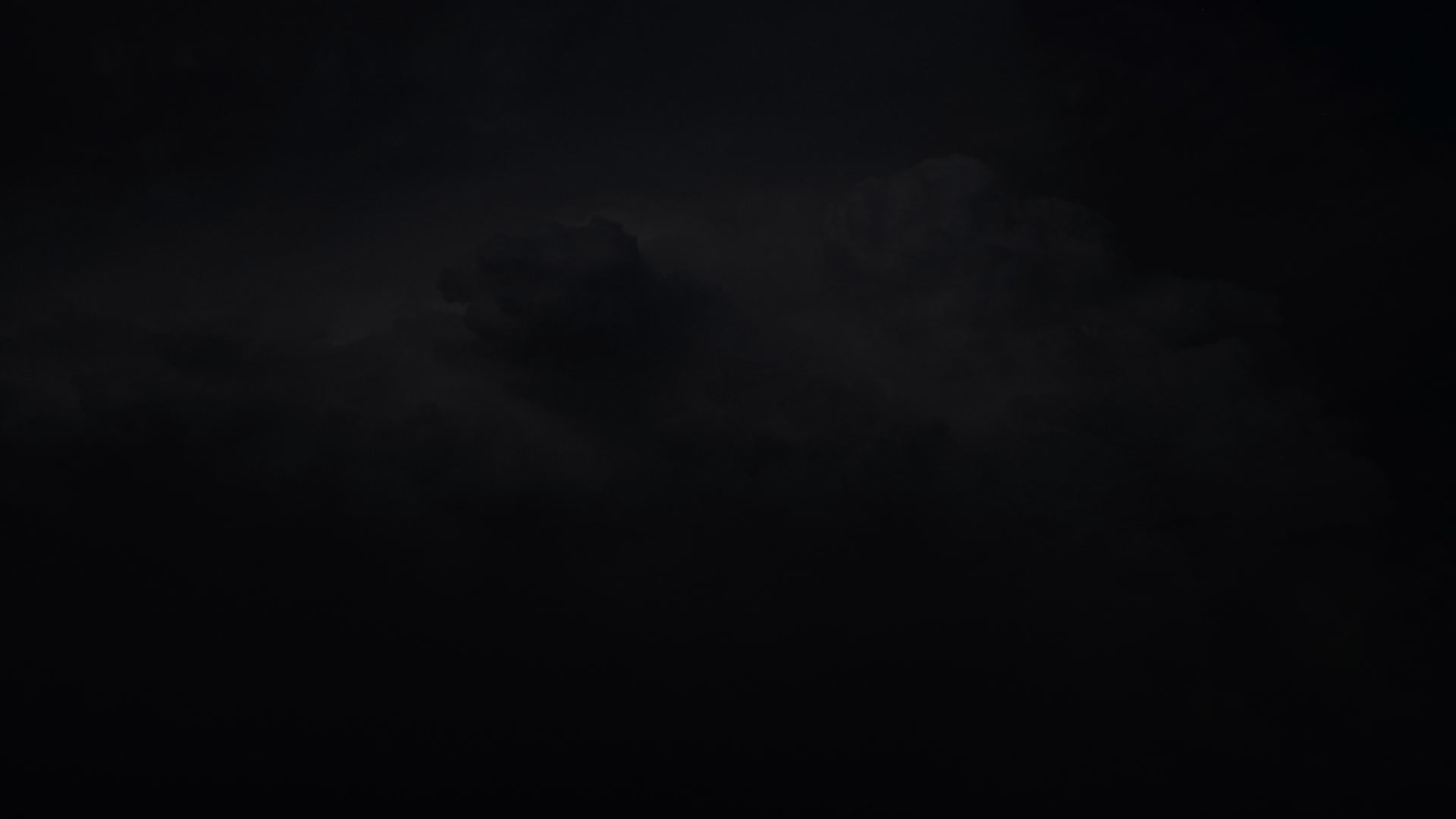 Dramatic lightning flashes inside top of storm, night