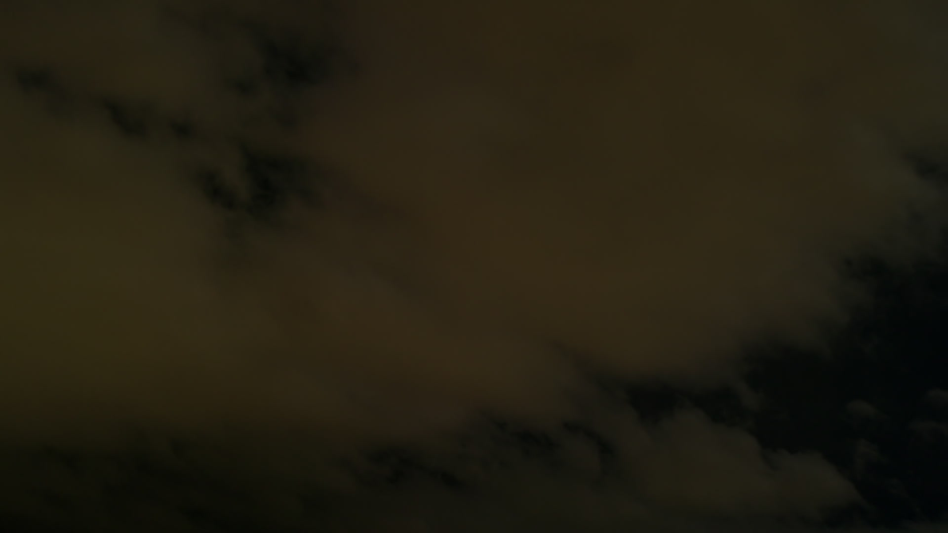 Close-up of continuous lightning above status clouds, night