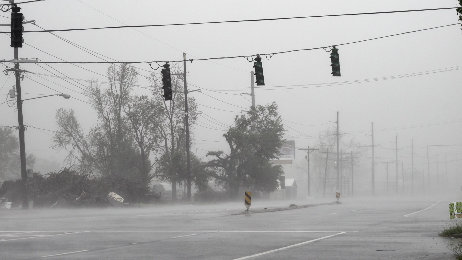Hurricane Delta - Intense winds, rain blow down street, traffic lights, 4K