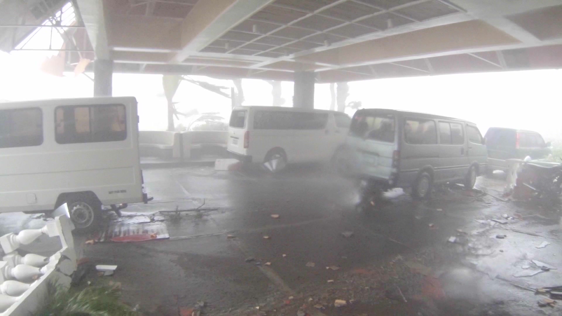 Super Typhoon Haiyan, intense wind, flying debris, vans, parking garage