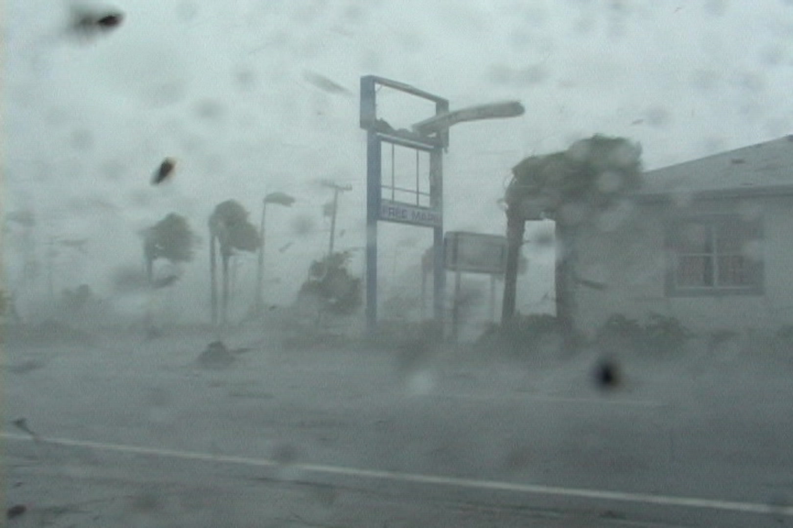 Hurricane Charley, Florida, Cat 4 - very intense winds blow sign apart
