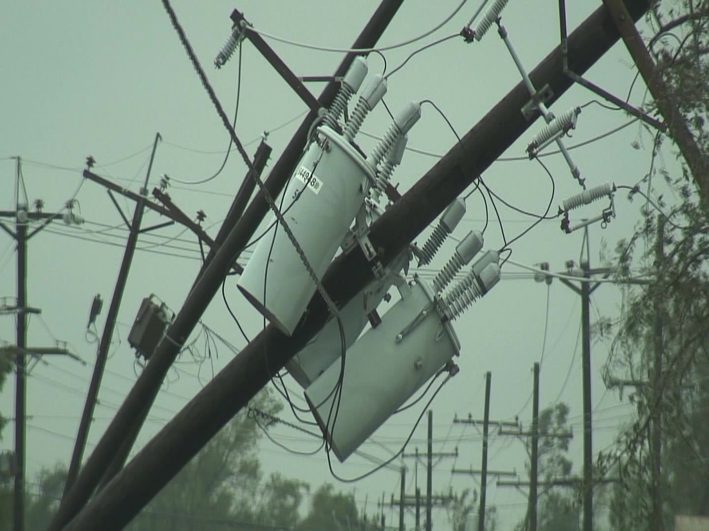Leaning utility poles, hurricane