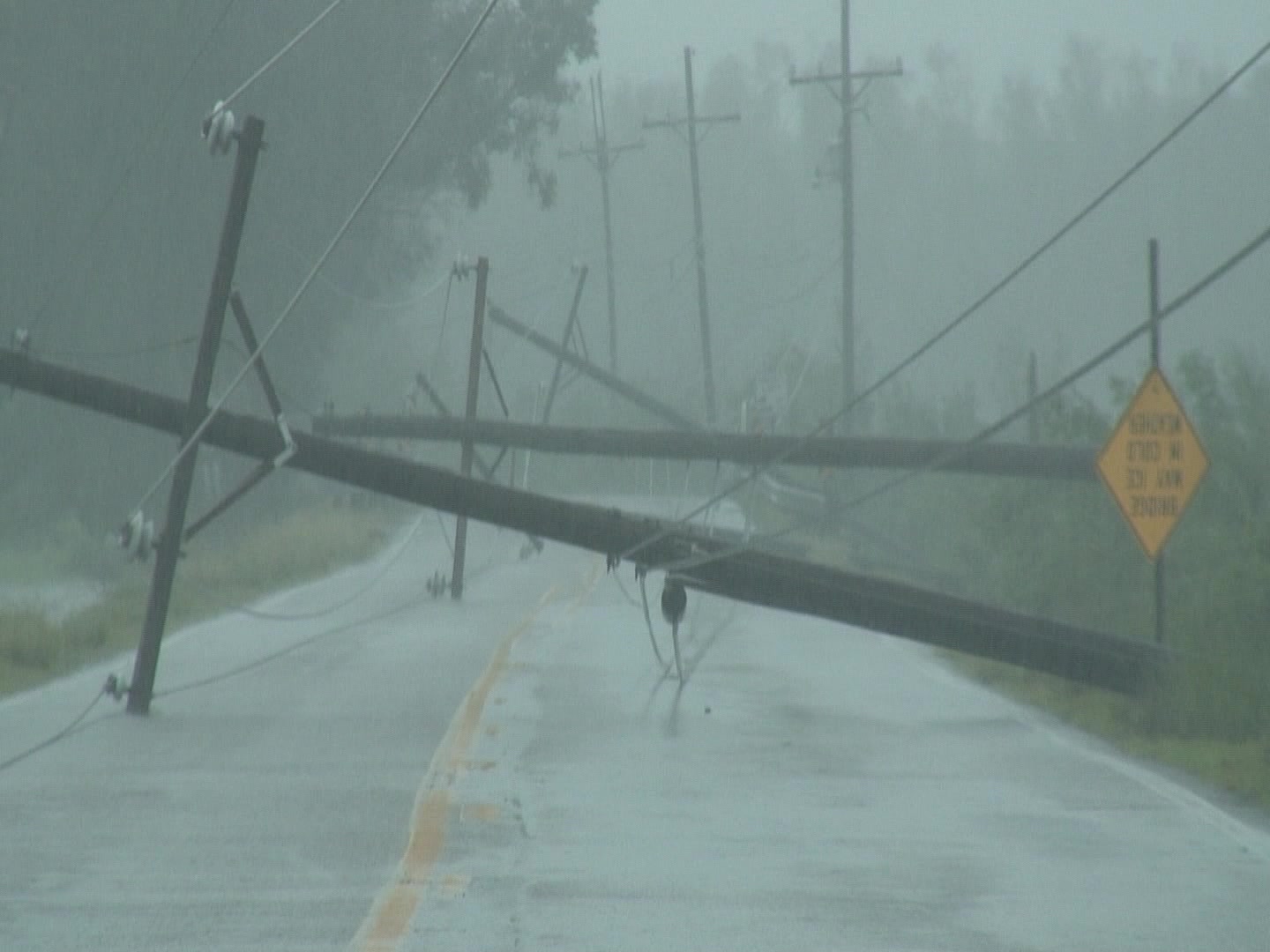 Downed utility poles on highway