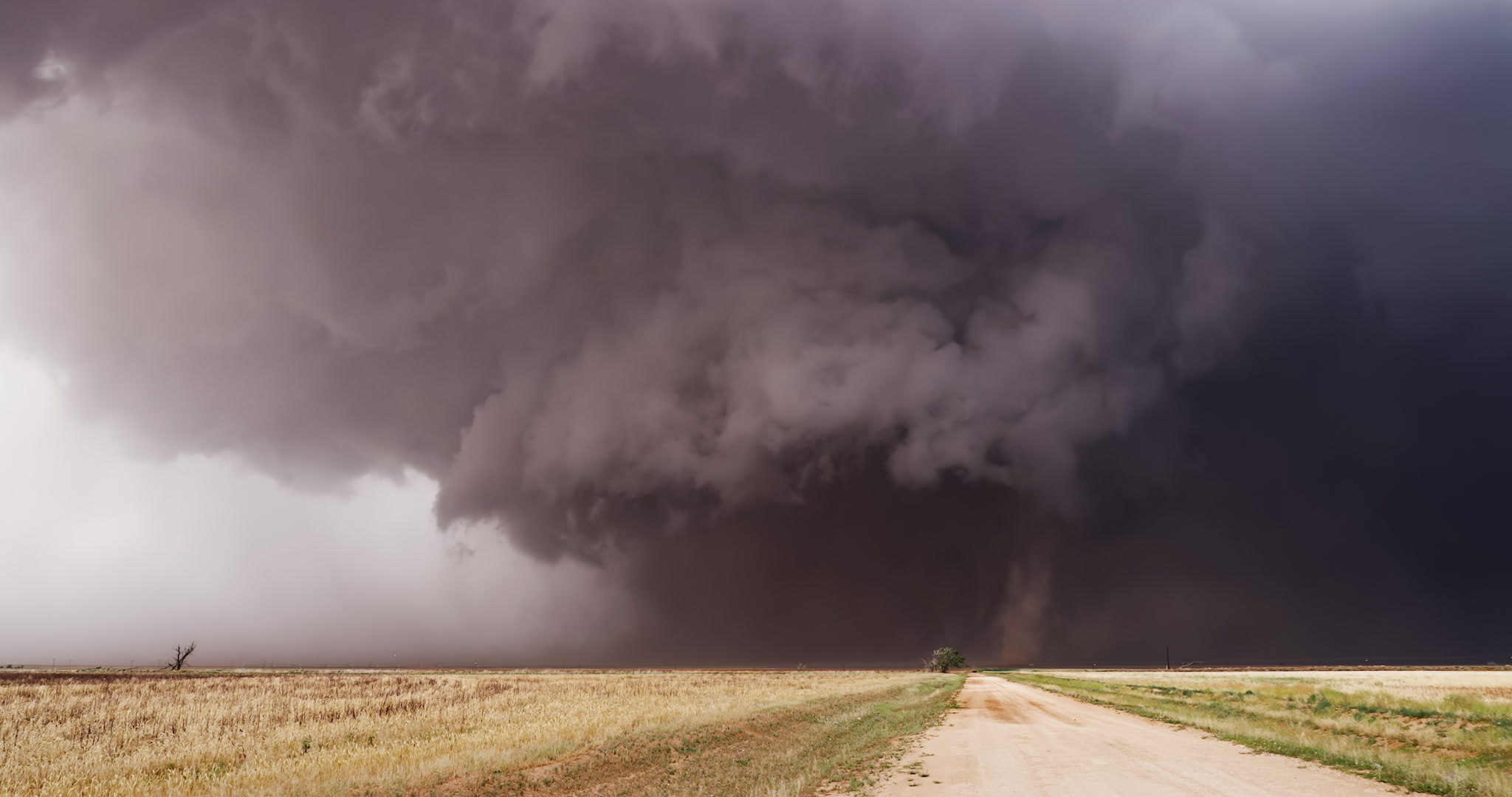 Texas Tornado - Big, dusty wedge tornado moves over road, satellite tornado, 4K