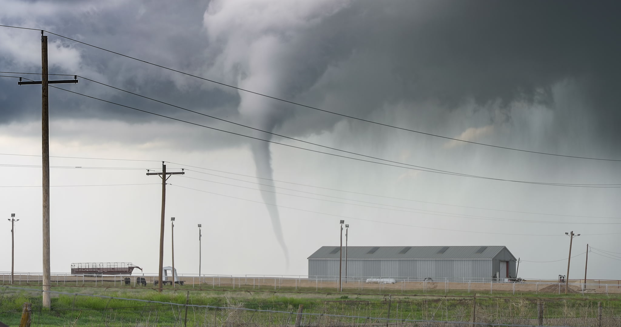 Texas Twister! Classic tornado behind farm, white car drives by, frogs and water in audio, South Plains, Texas, 4K