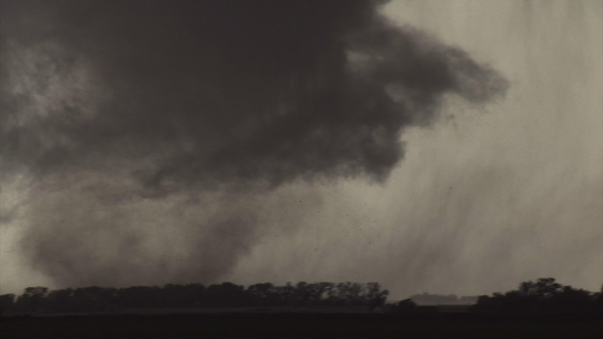Oklahoma Tornado - Zoom into large tornado behind trees