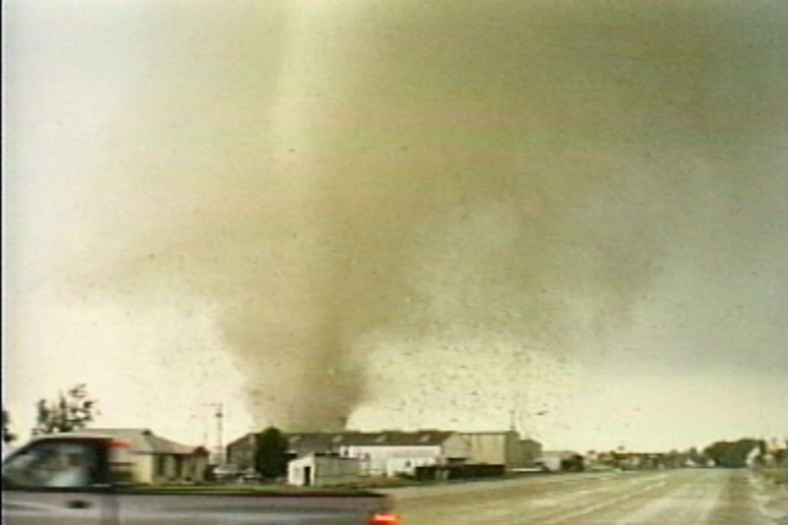 Pampa, Texas tornado tracks over houses, toward street, looking north